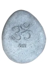 Pebble with OM symbol as relief 
