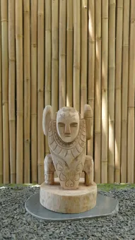 Tiki statue Polynesia style. From coconut palm 
