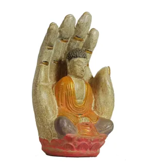 Sitzender Buddha in Hand, Steinguss, handbemalt, ca. 15 cm 
